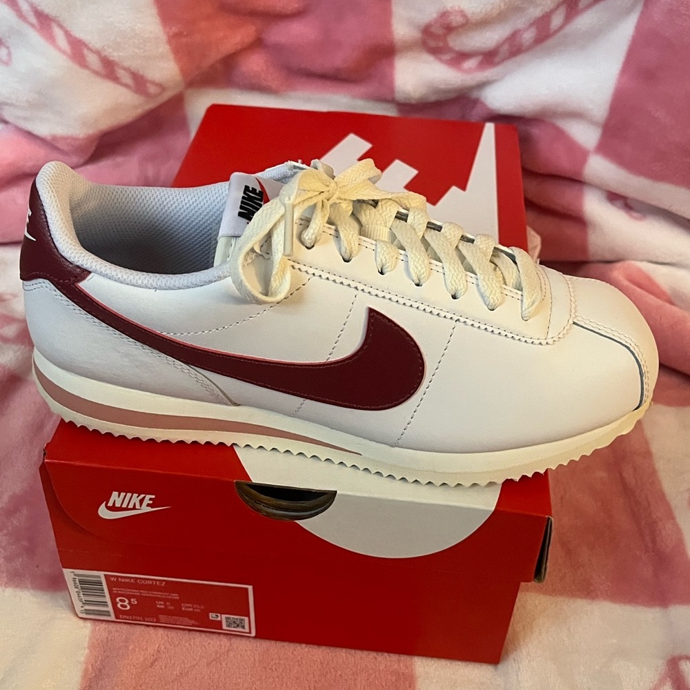 Nike women’s White and Red Sneakers